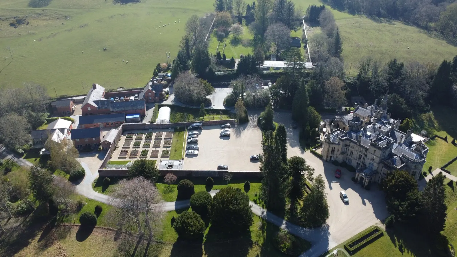 Palé Hall, its formal gardens and the Welsh countryside